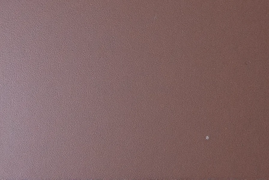 Close-up view of cinnamon slate texture showing natural fissures and warm reddish-brown color variations in natural lighting