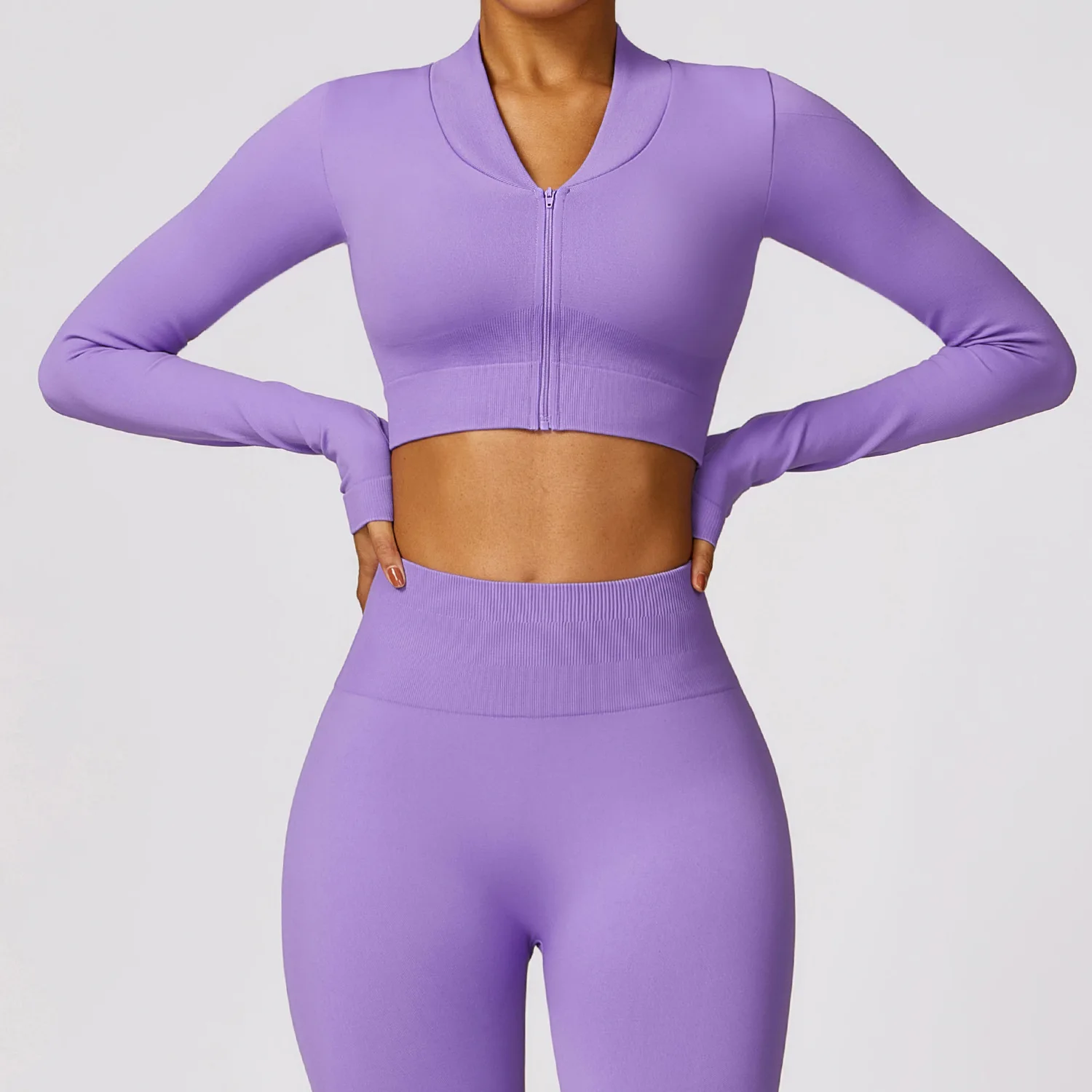 

Winter tight seamless long sleeved yoga jacket Zipper quick drying fitness suit for women's running sports Waist revealing sexy