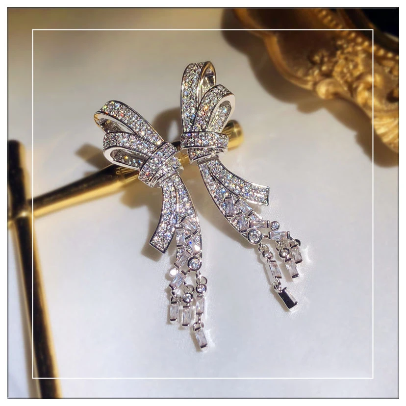 

High Quality Wholesale Fashion Design KYED0297 CZ Earrings Platinum Plated Bowknot 3A Zircon tassel earrings for Women
