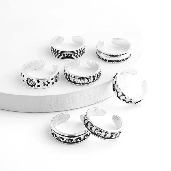 

Wholesale New Creative Jewelry Summer Beach Alloy Adjustable Women Open Foot Rings 7 Pieces Hollow Star Moon Toe Ring Set, Silver