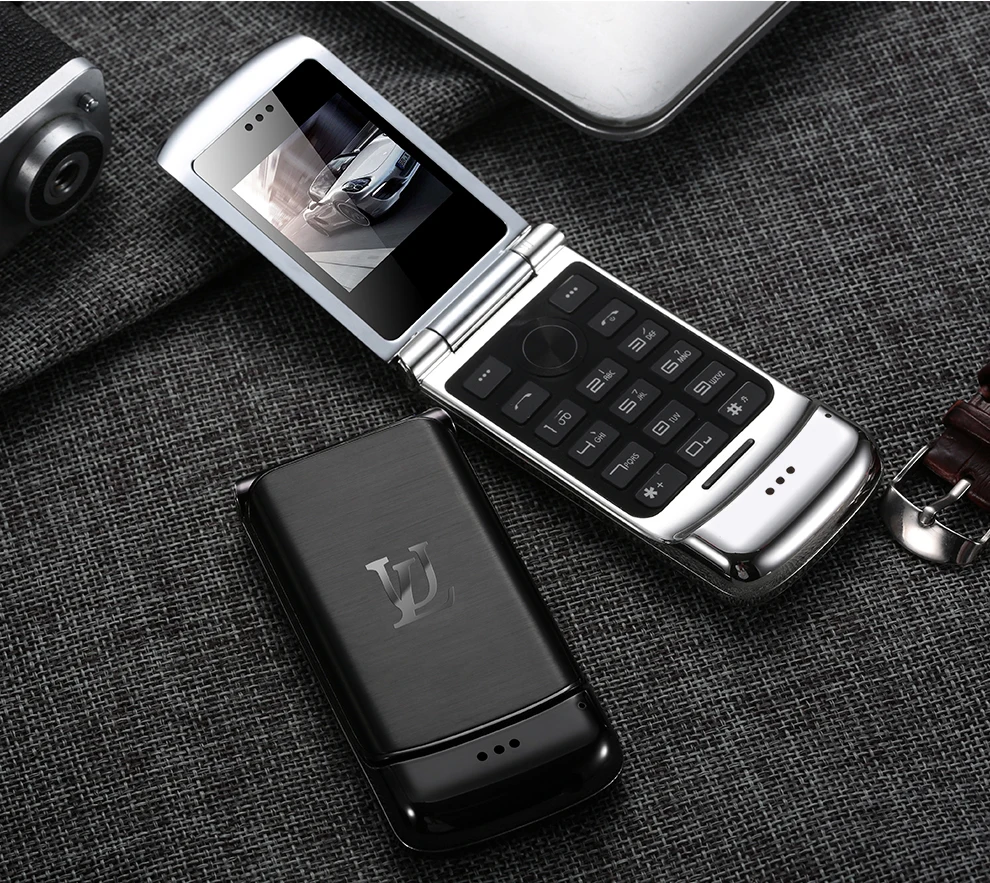 

Ulcool V9 Luxury Clamshell Phone Mini Flip Cell Phone Metal design With 1.54 inch FM MP3 Bt Dialer Anti-lost Mobile Phone