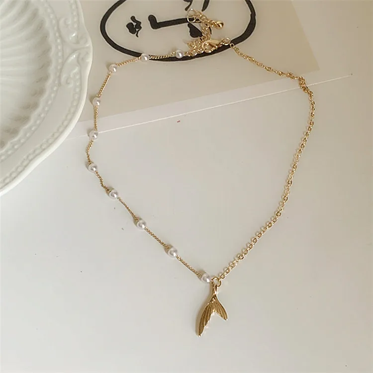 

Duoying OEM joyas romantic fish tail pendant necklace asymmetric chain necklace pearl minimalist necklace for women, Gold