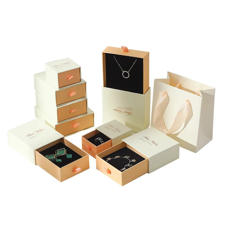 A collection of modular jewelry storage boxes showing perfect stacking and organizational efficiency.