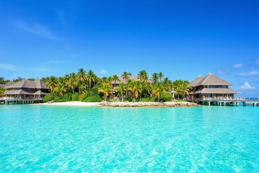 Aerial view of Cinnamon Dhonveli Maldives showing the resort layout with beachfront chalets surrounding a central lagoon