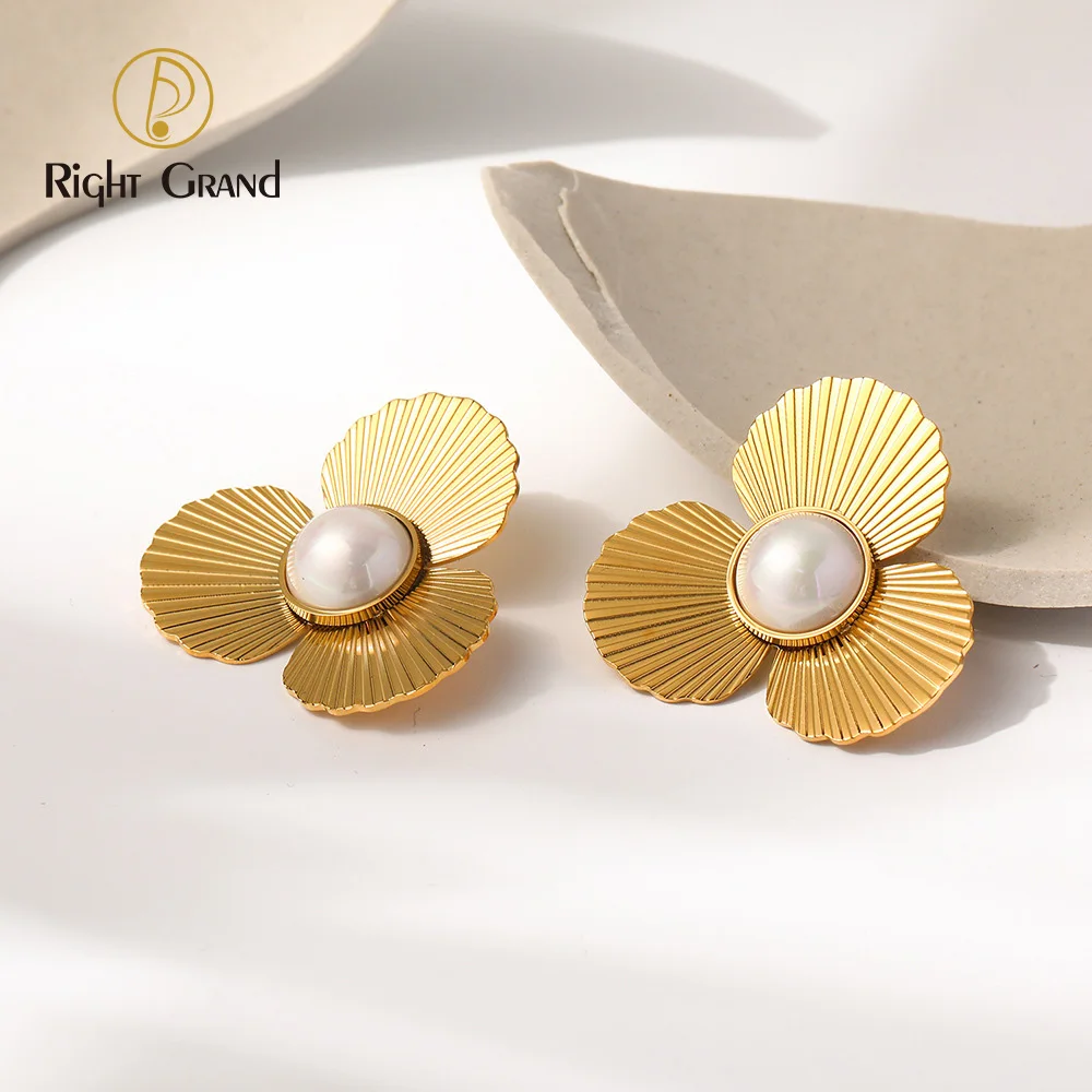 

Fashion new stainless steel gold plated texture light luxury set pearl flowers exaggerated earrings