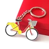 Custom yellow bicycle bike logo wholesale soft enamel metal 3D effect keychain keyrings with your logo
