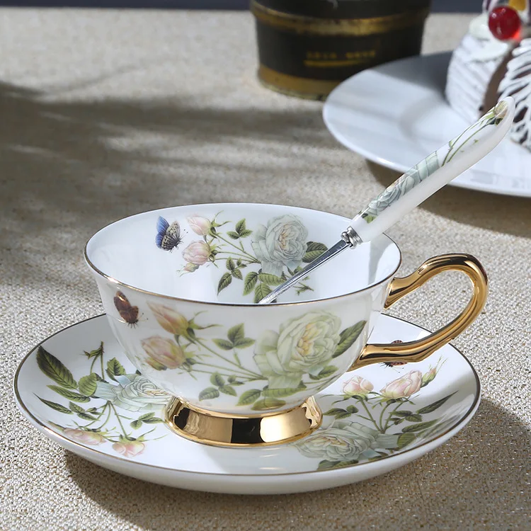 

Cheap Dropshipping Wholesale Taza Cafe Decorada Con Flores Fine Bone China Tea Coffee Cup Flowers And Saucer Tea Set With Spoon, White camellia, rose, lily, rose, stamp, boat
