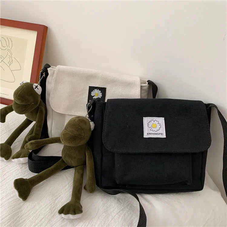 

Hot Fashion Korean Version Solid Color Messenger Crossbody Shoulder Straps Canvas Small Daisy Bags for Women, Black white