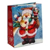 Wholesale traditional Santa carrying christmas gifts to celebrate new year glossy paper bag