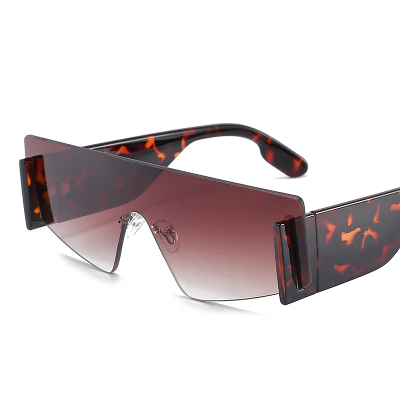 

2021 Fashion big wide-leg female sunglasses rimless sunglasses male ins style one-piece glasses