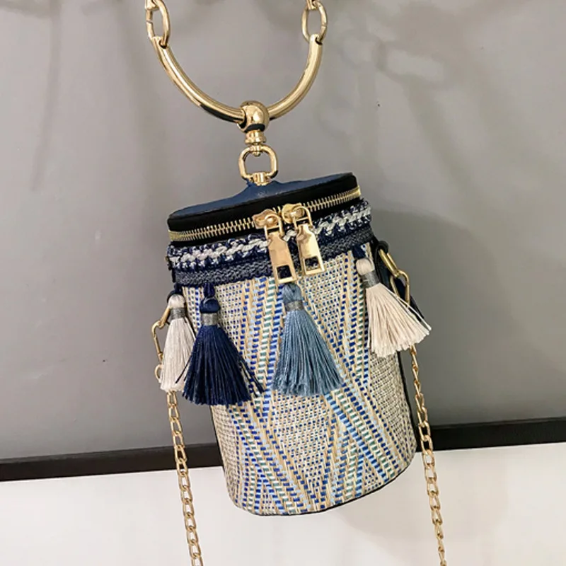 

fashion designer chain ring handle shoulder bag straw cylindrical small tassel bucket bag women handbag