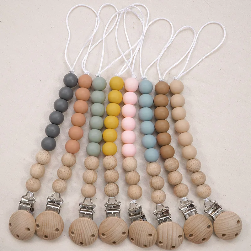 

New Design Silicone Baby Teether Pacifier Clip Chain BPA Free Baby Silicone Teether Wooden Connection Buckle Teether, Customized