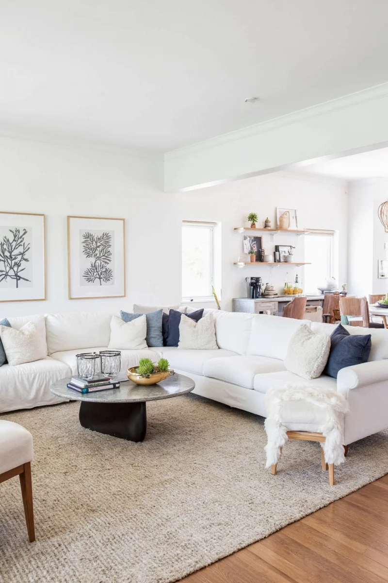 White sofa living room with kid-friendly layout