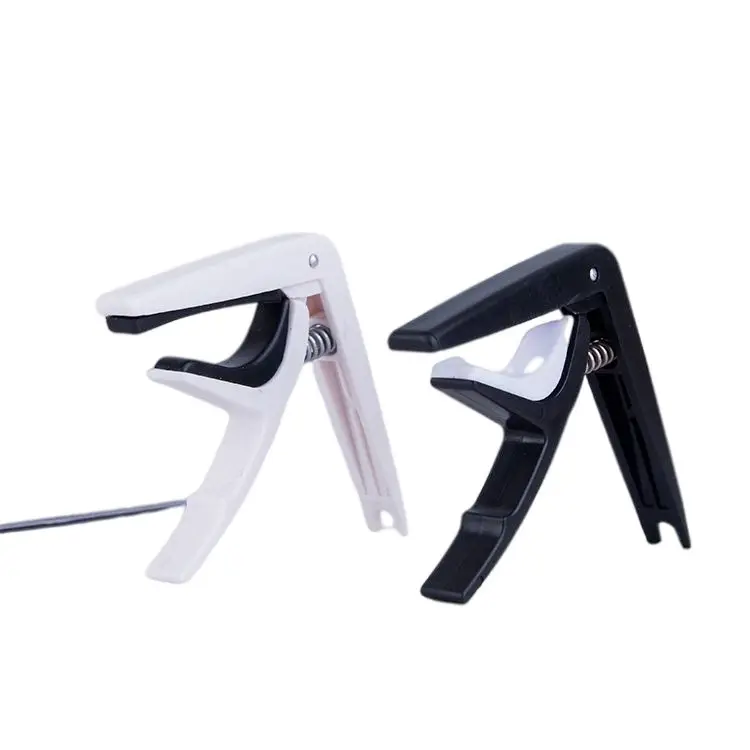 

Hot Sale Guitar Accessories Xe Plastic Capo For Acoustic Guitar Electric Guitar Or Ukuleles