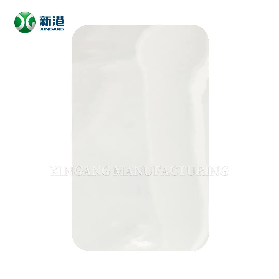 Rounded white high gloss HPL laminate sample on a white background