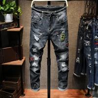 

2019 hot new style Men Leisure Biker jeans embroidery printing badge patch Spray paint High street Breathable black pants