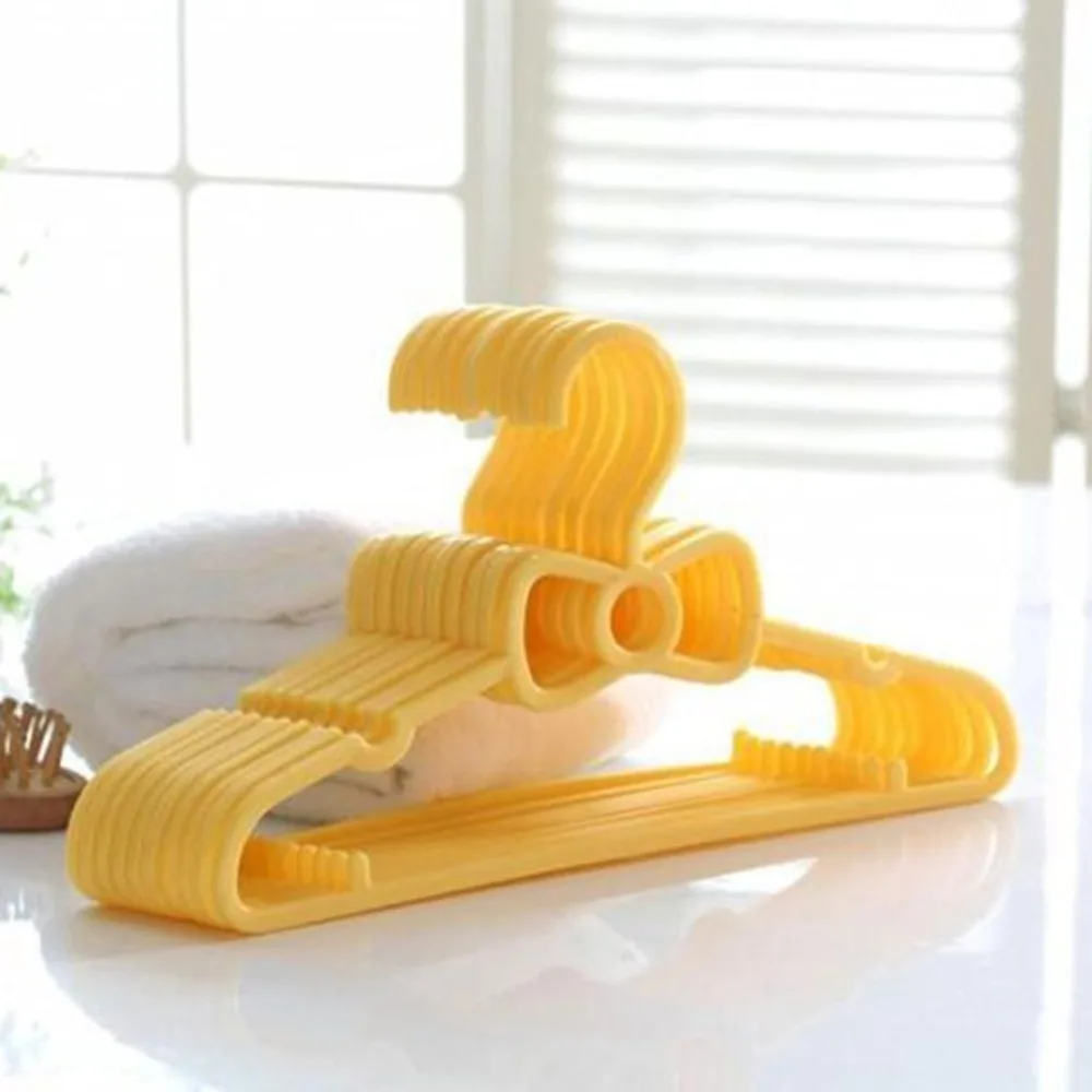 

Multi Colorful Plastic Kids Clothes Hangers Baby Clothes Hanger 10pcs Set Children's Bow Hanger Wholesale, As photo