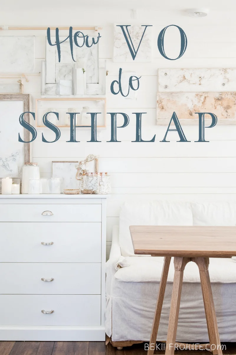 Child helping paint shiplap wall