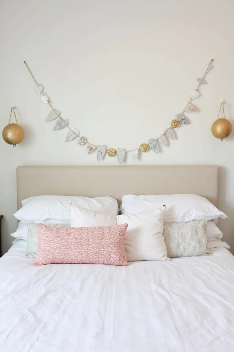 Floating shelves with storybooks and stuffed animals