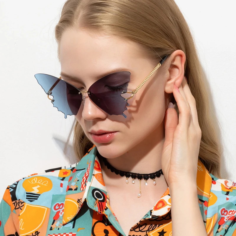 

2021 new personalized butterfly retro frameless gradual change sun glasses