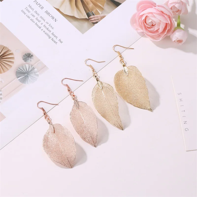 

Korean style creative simple natural leaf lady earrings exquisite hollow out bride earrings wholesale, Optional