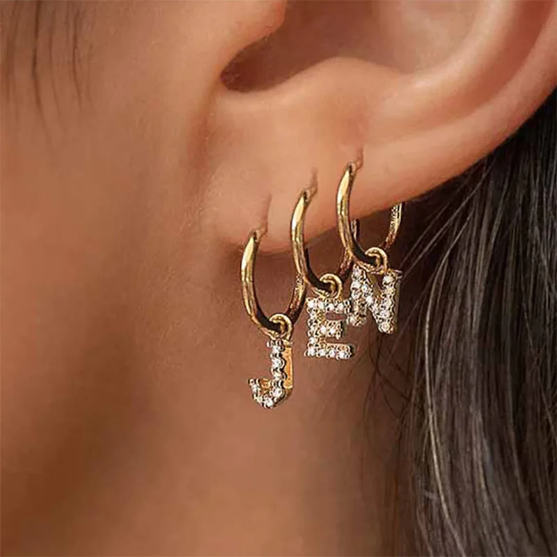 

Factory wholesale Europe and America 26 letter asymmetric gold plated small hoop earrings women's popular jewelry earring, As picture