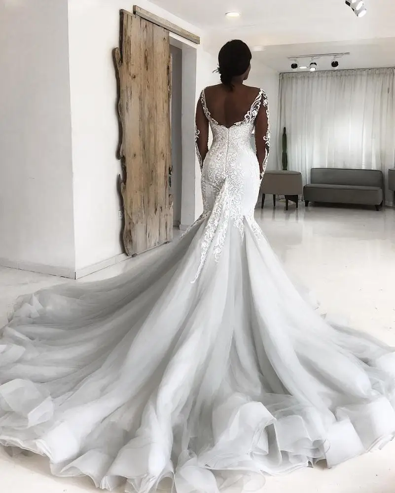 Neueste Spitze Appliqued Langarm Afrikanische Braut Weiss Meerjungfrau Hochzeit Kleider Mit Tails Buy Braut Kleid Weiss Afrikanische Hochzeit Kleider Lange Afrikanische Hochzeit Kleider Product On Alibaba Com