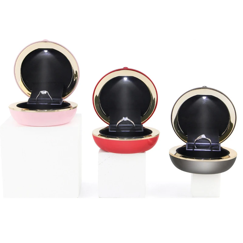

Wholesale Luxury Packaging Wedding jewelry box with led lightround circular oval luxury led lights leather jewelry ring necklace