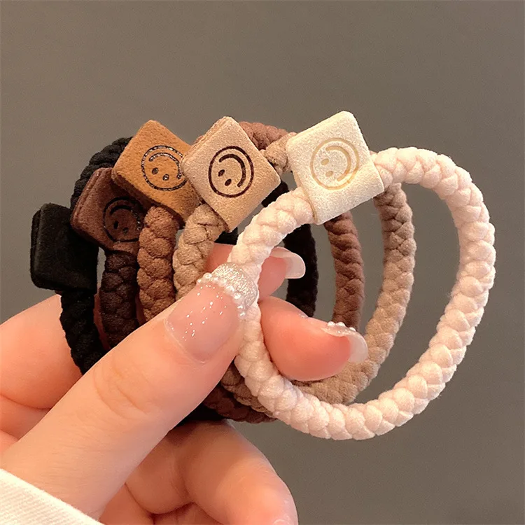 

2024 Fashion New Design Women Girls Solid Color Scrunchies With Smiley Face Label 5PCS Strong Elastic Hair Ties Rope