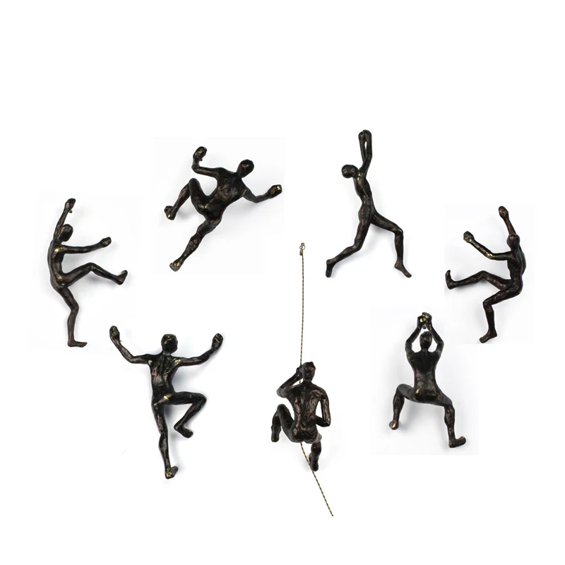 Wholesale 3D Artificial Resin Black Climbing Men Object For Wall Decor supplier