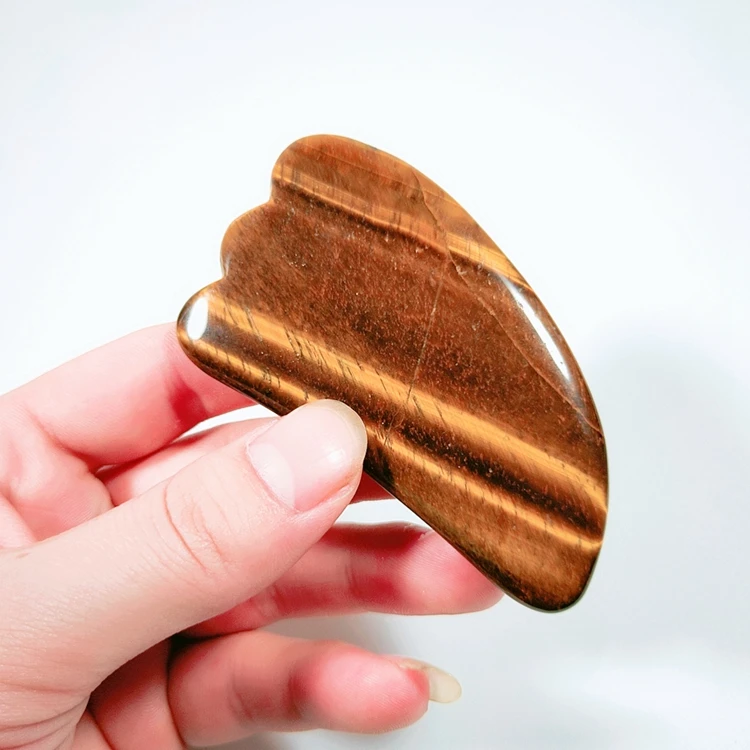 

2020 customized facial beauty scraping tool Yellow Tiger Eye guasha board