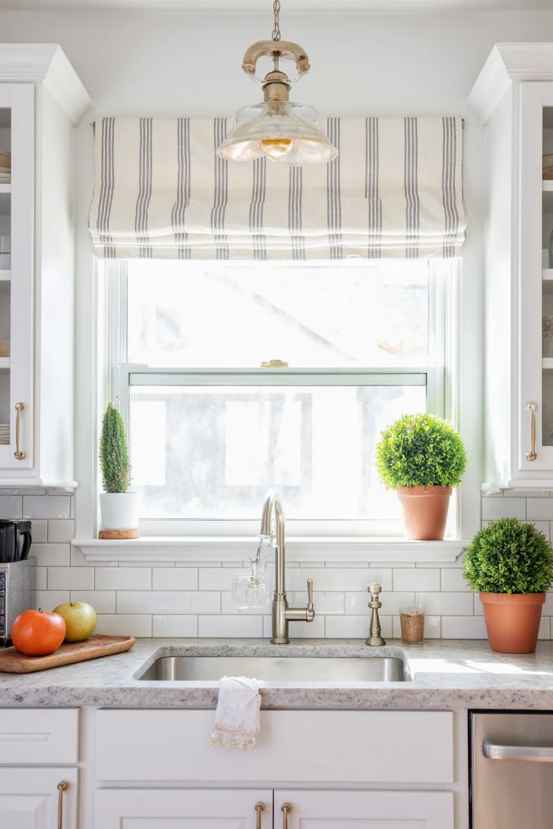 Floating shelves with greenery around kitchen window