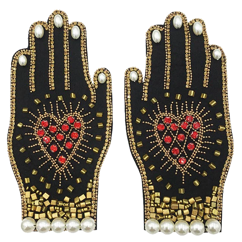 

A new pair of fine hand nailed pearl cloth pasted with glass diamond winter clothes, hat and sweater decorative decals