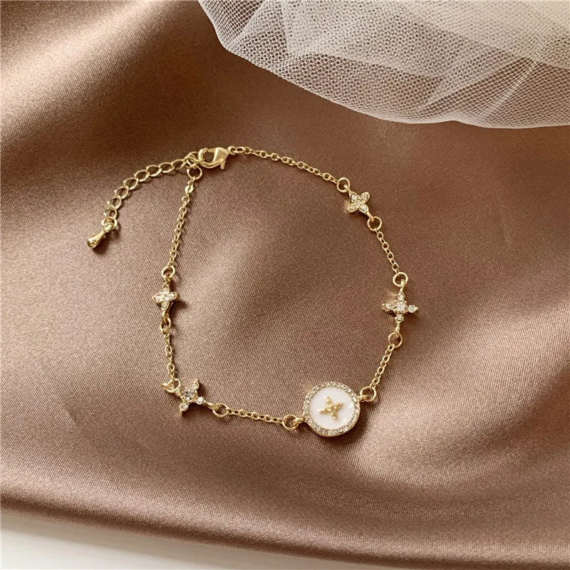 

New Micro-inlaid zircon plum blossom cross light luxury high-end style bracelet niche design jewelry gift for women, Gold