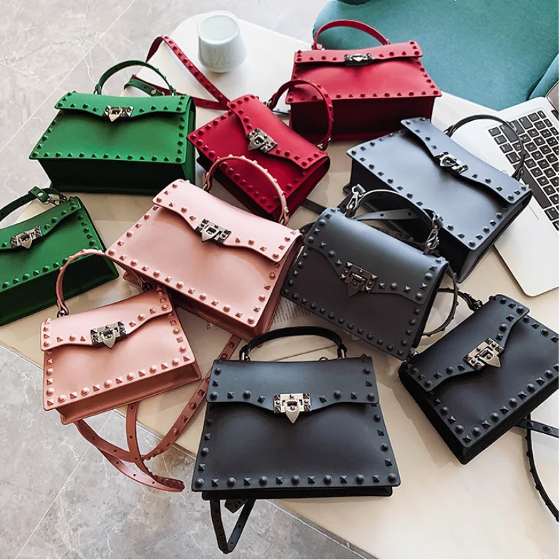 
TS9049 designer transparent jelly shoulder tote lady bag fashion woman bag fashion pvc leather rivet beach handbags for women 