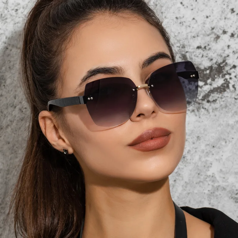 

New Trend Wholesale Gradient Square Sunglasses 2023 For Men Unisex Fashion Purple Rimless Hexagon Shoot Glasses