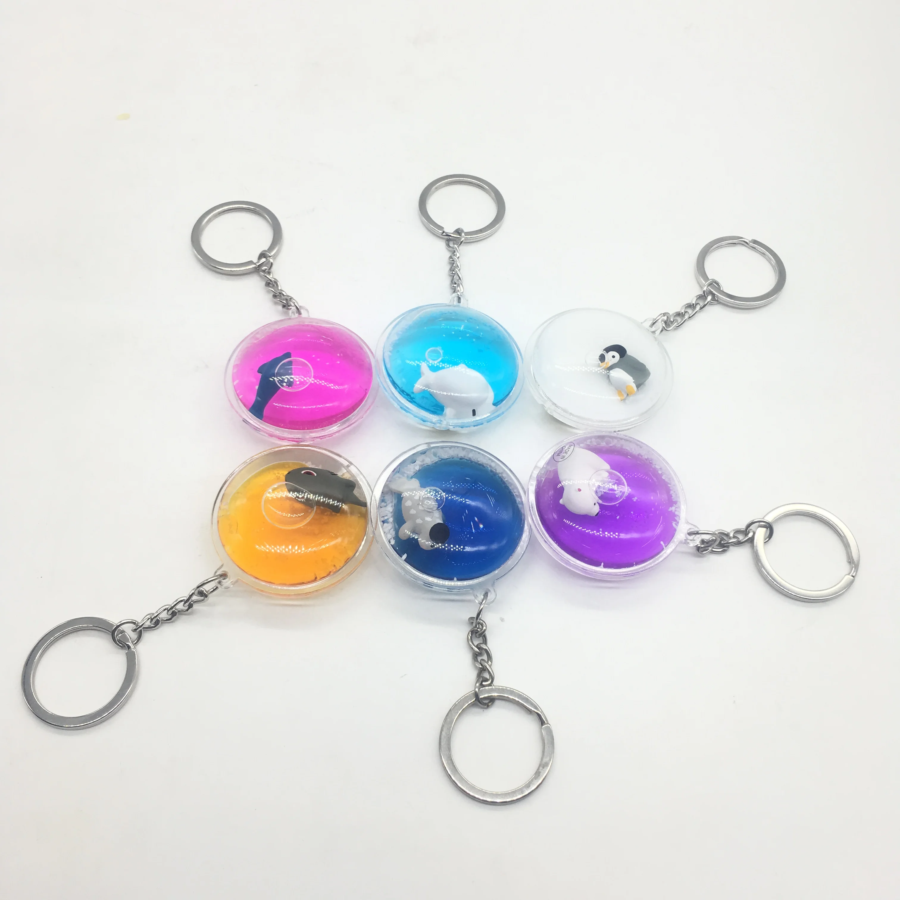 

Factory Price Promotional Clear Transparent Acrylic Keyring Plastic Glitter Quicksand Liquid Floating Cartoon 3D Keychain