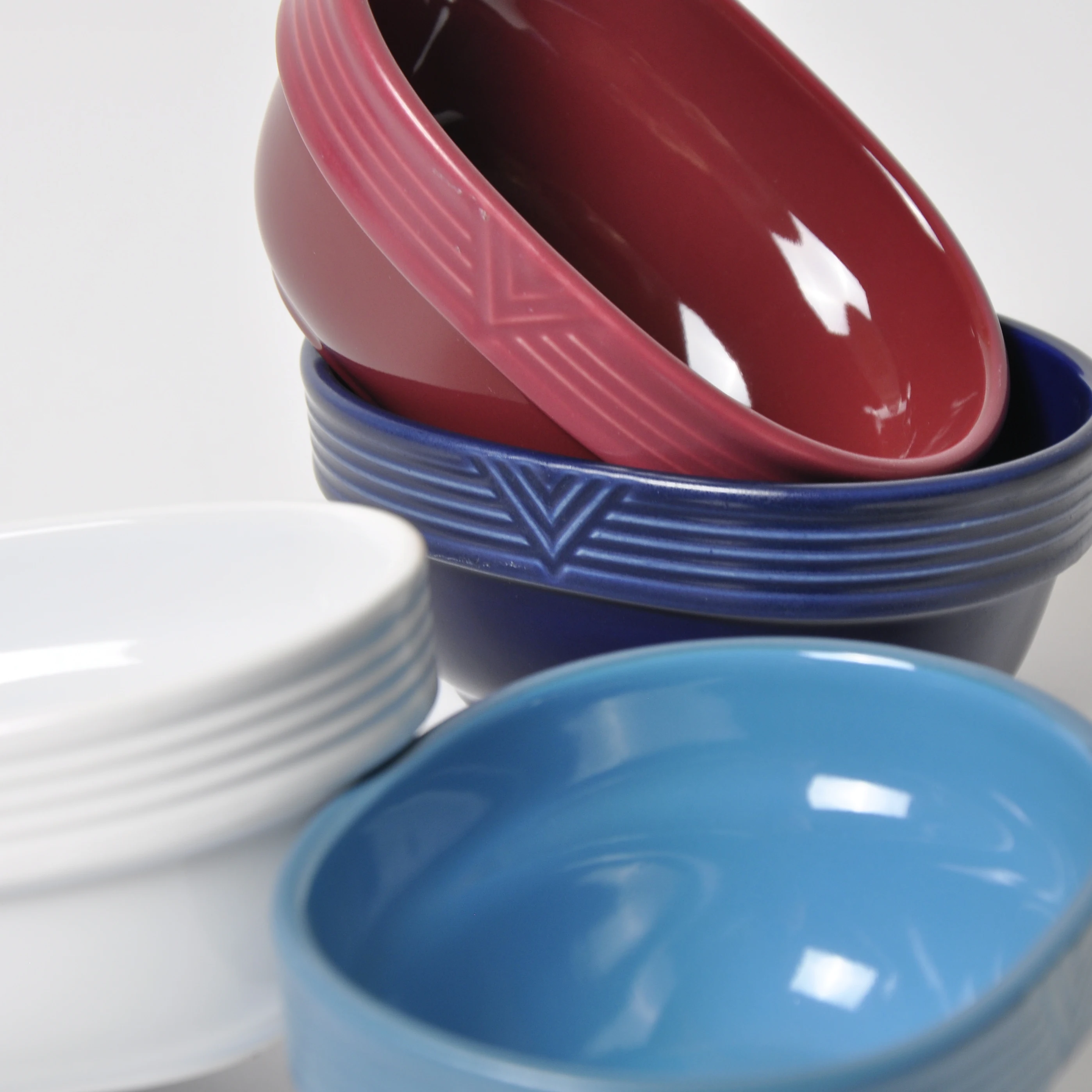 
New Design Colored Glaze Relievo Intagkio Oval Creamic Dinner Bowls Luxury Ceramic Bowl 