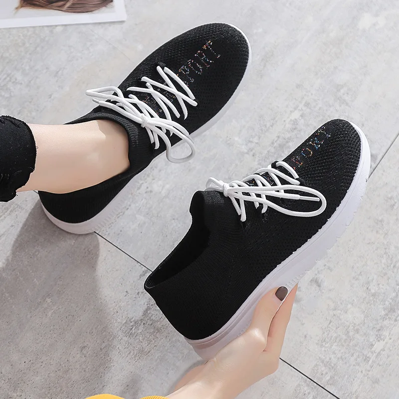 

New solid color fashion flying sneakers Wholesale Cheap Slip-On Breathable Running Shoes 2021 Women Sneaker