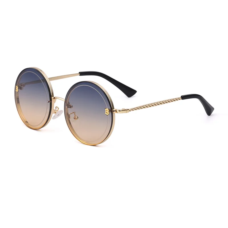 

Fashion round personality rimless red lens women shades sunglasses 2A274