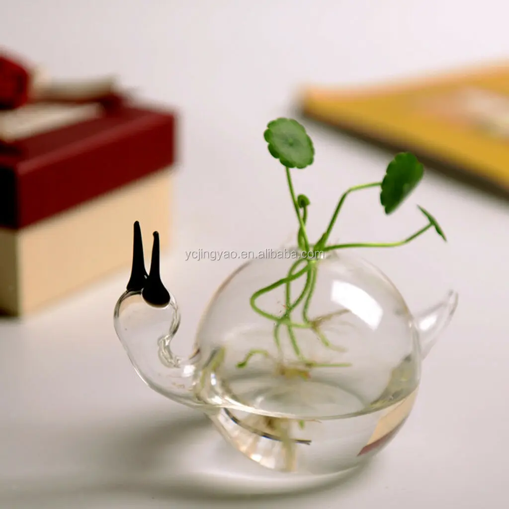

crystal clear snail shape glass vase for home table decoration