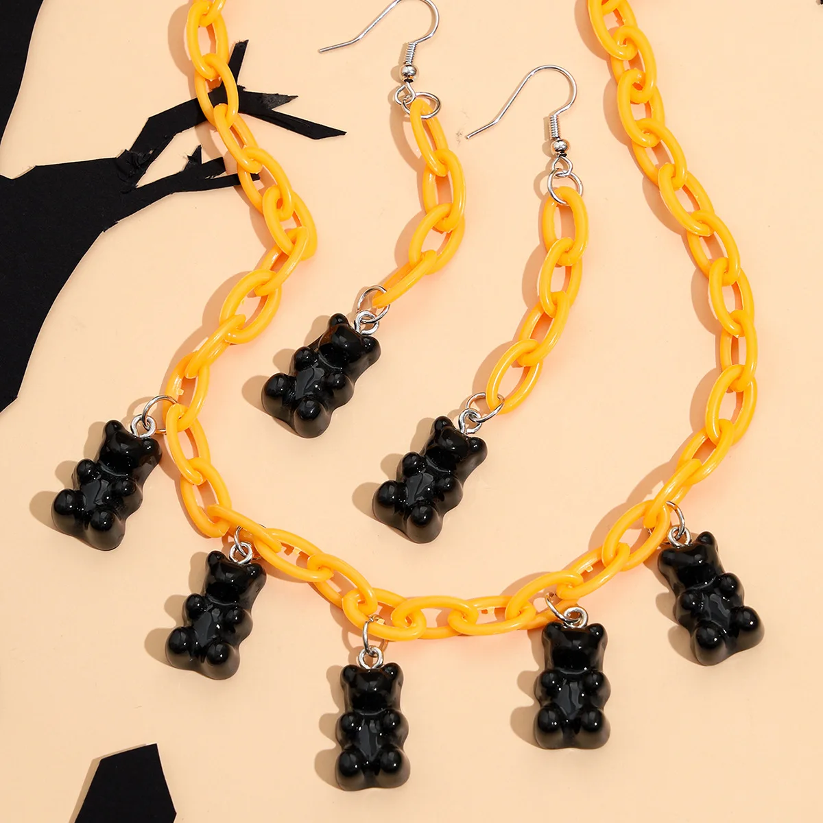 

Ding yi 2021 Europe and the United States foreign trade new resin black Bear Bear pendant earrings necklace lovely children suit