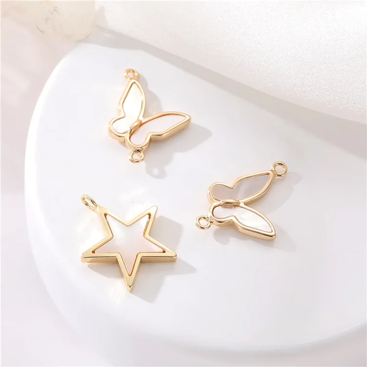 

Jiexing Wholesale Jewelry Making Five-star Butterfly Charm Brass 14K Gold Plated Shells Pendant Charm