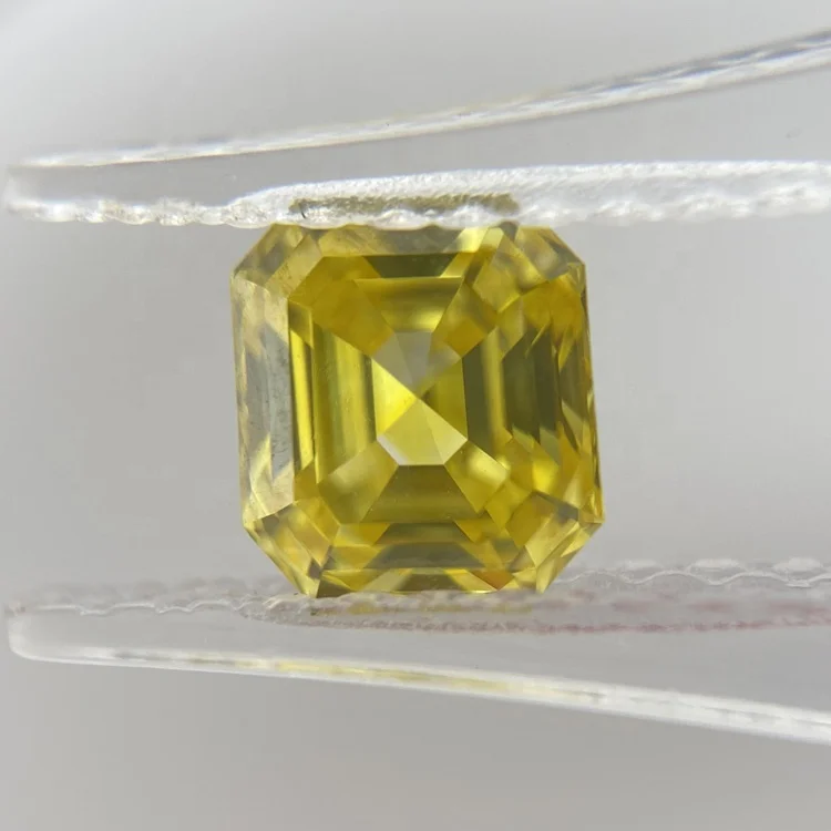 

Synthetic HPHT fancy vivid yellow lab grown loose CTI certified 1.06ct VS2 Emerald cut polished yellow diamond