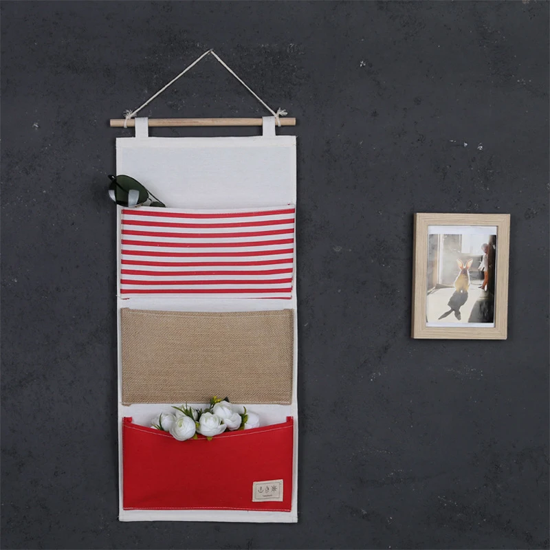 

Stitching cotton and linen storage hanging bag textbook sundries wall storage organizer hanging bag