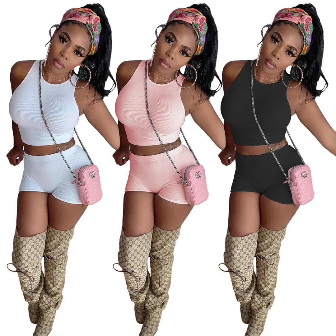 

Free Sample SM9179 Fashion Leisure Two Piece Set Sleeveless Solid Color and Round Neck Short Top and Pants Outfit Sexy 2 Piece Sets