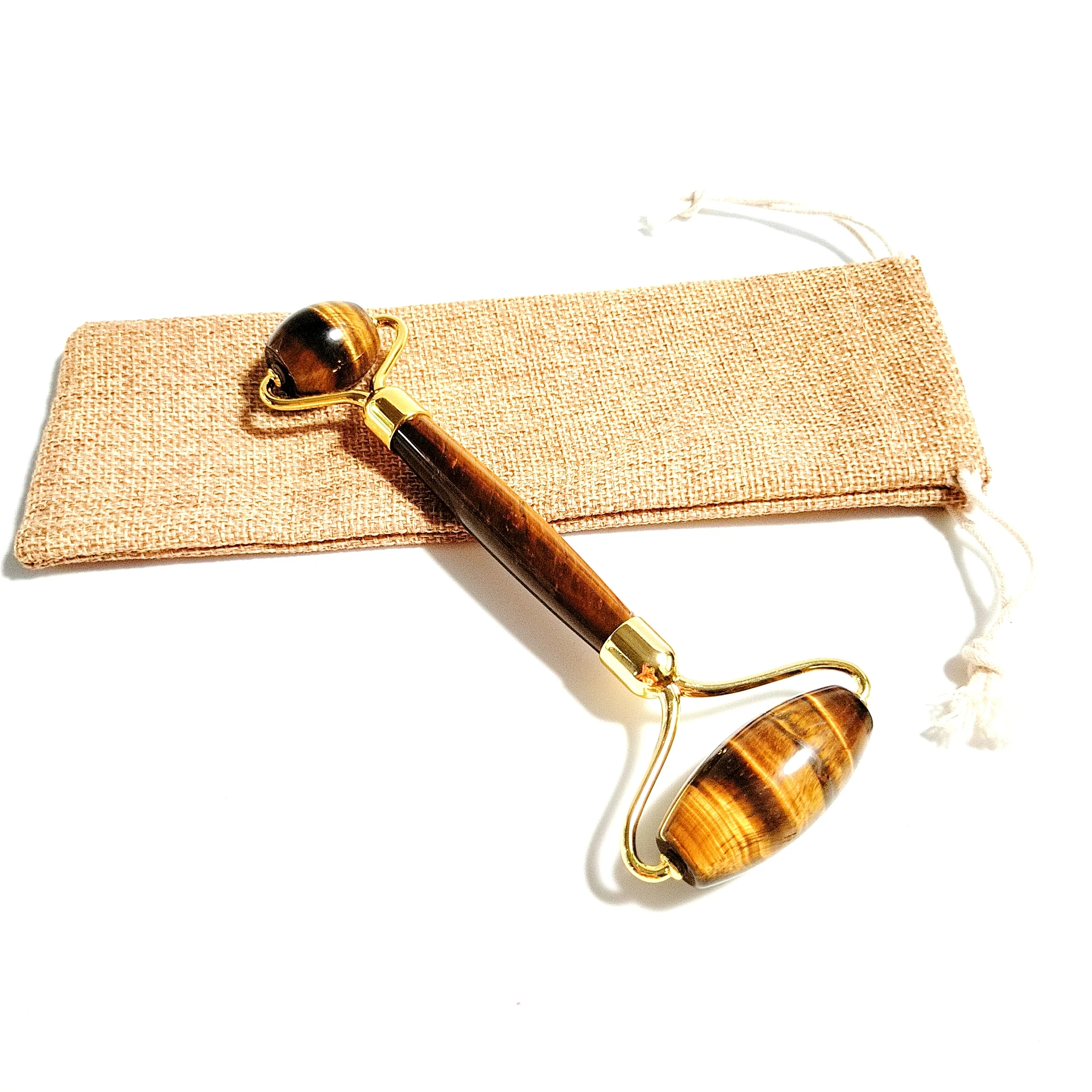 

Jade Roller and Gua Sha Scraper Massager for Face Body Anti-Ageing Therapy Tiger eye Board