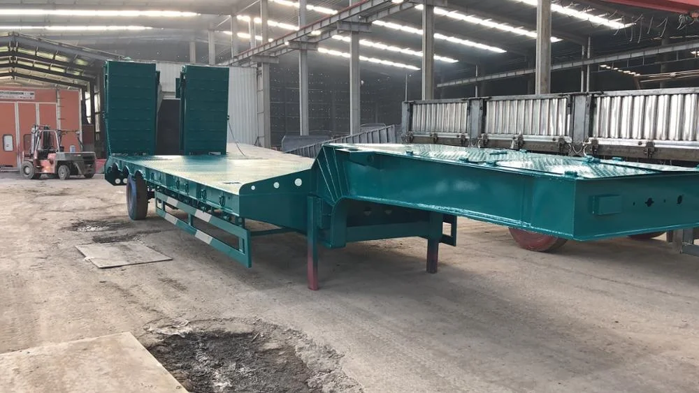 Factory direct sale tri-axle 60T low bed semi trailer with hydraulic ramp for transporting heavy duty equipment .jpg