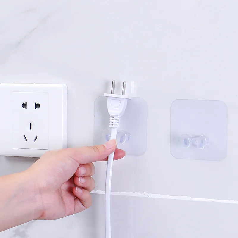 

Multifunctional Punch-free Plug Hook Transparent Wall Hanging Storage Multi-function Adhesive Power Cord Socket Hanger