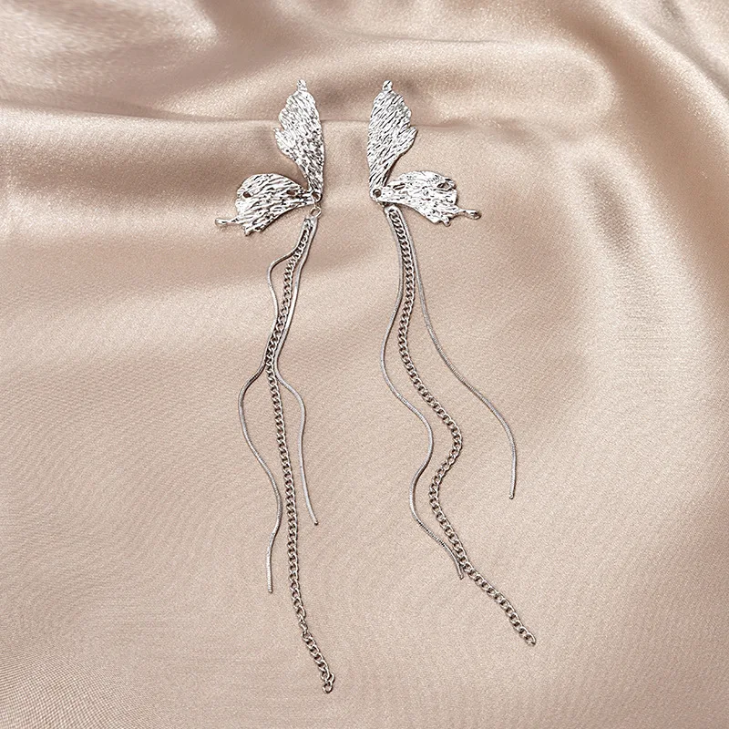 

Fashion Silver Needle Embossed Asymmetric Butterfly Tassel Earrings Elegant Butterfly Long Earrings